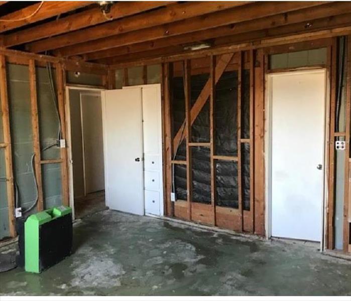 Bedroom with the home framing showing. Missing walls and ceiling